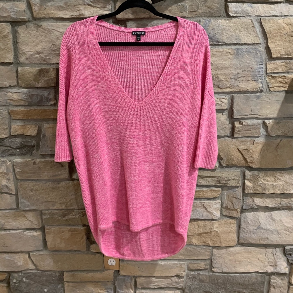 Long, pink sweater.